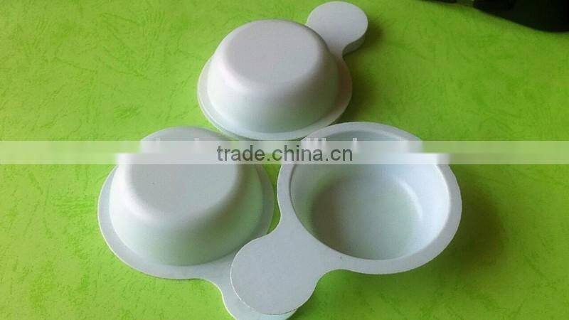 white disposable plastic tray for urine testing.