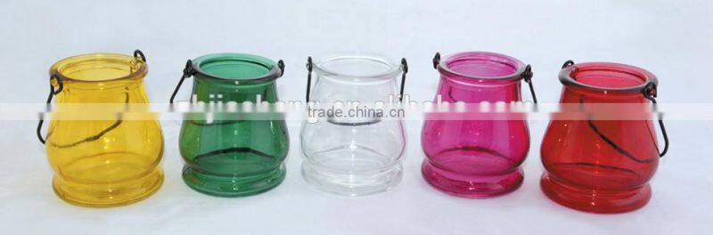 colorful glass candle jar with metal handle