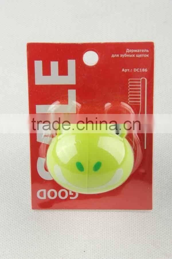 Frog shaped plastic toothbrush holder