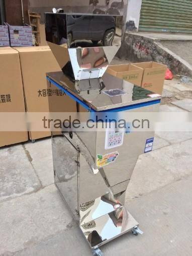 Semi-automatic Stainless steel weighing 10 -999 grams table type filling mchine