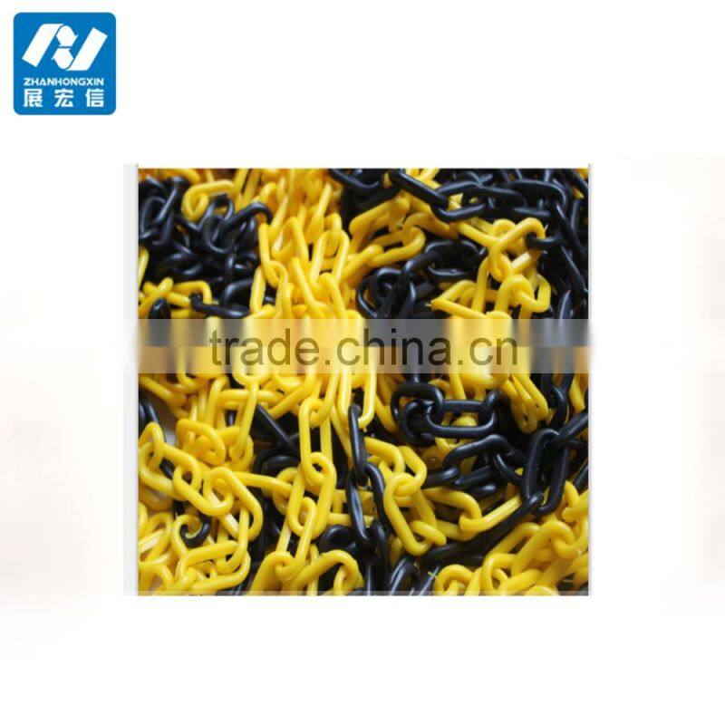 Yellow/Black Water filled barrier with plastic chain