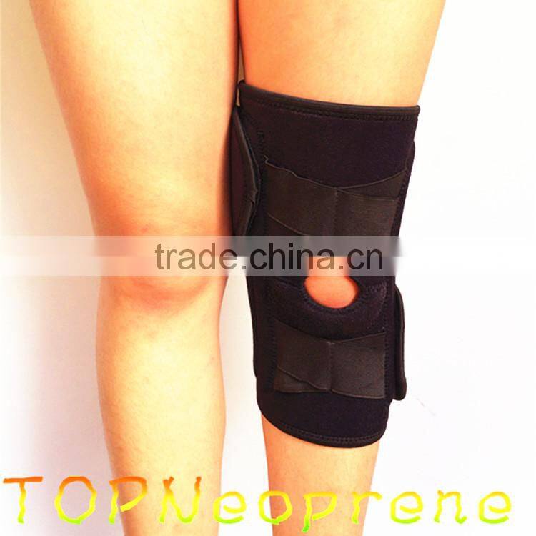 Compression neoprene knee support with adjustable spring support