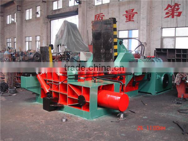 Horizontal baler with manual belting