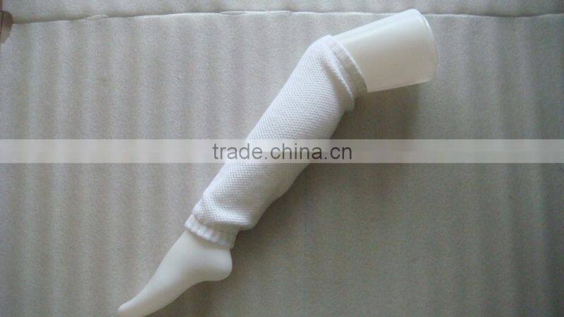 Lady knitted white boot leg warmers