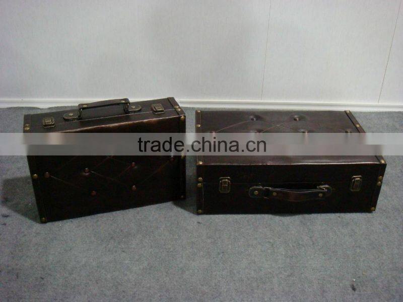 Retro style leather suitcase wood