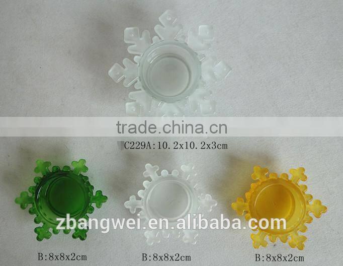 snowflake-shaped glass candle holder