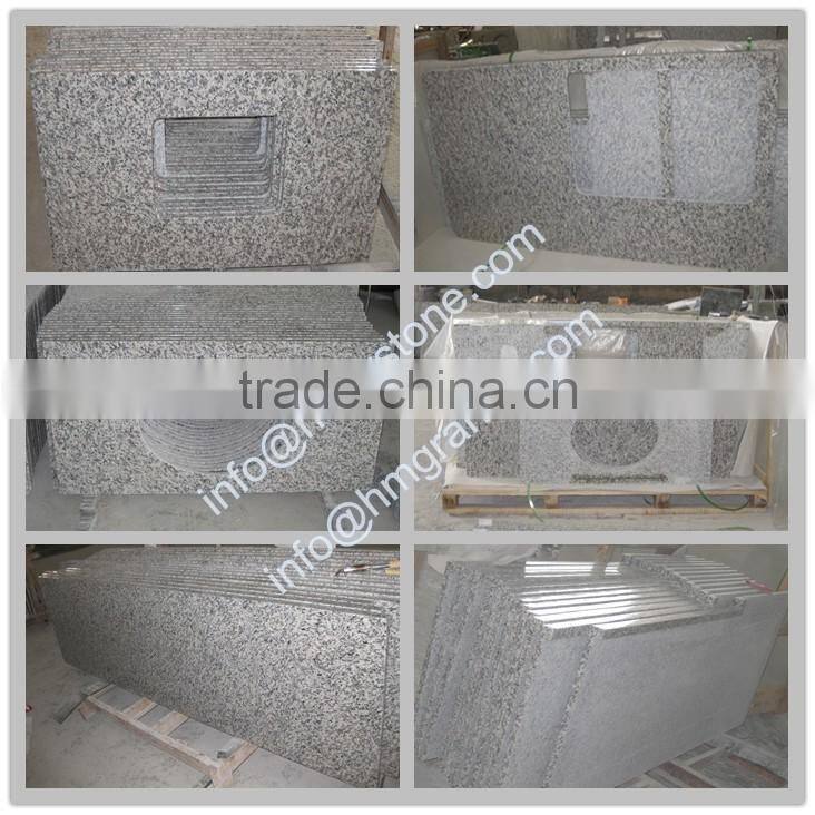 China Tiger Skin white granite kitchen countertop with upmounted sink