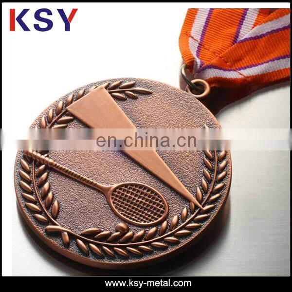 Nickle free metal medal with brass plating