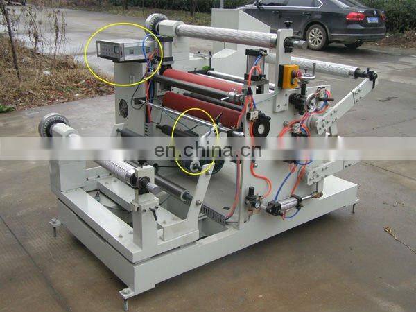 Double sided adhesive tape slitter rewinder machine