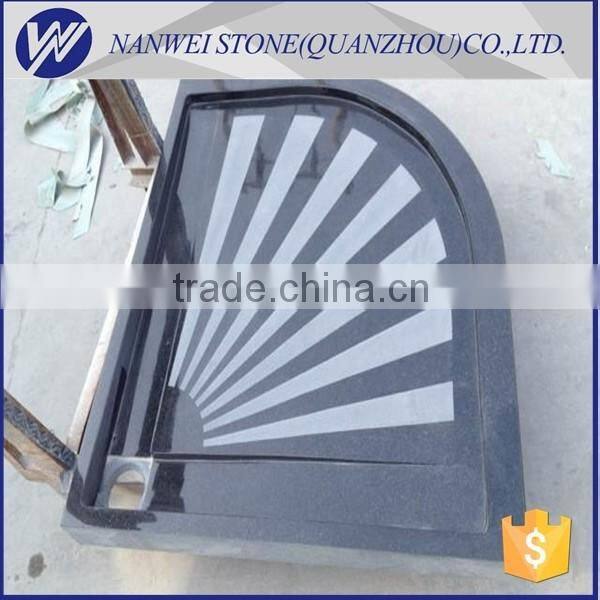 black and grey granite kerbstone and paving stone in city construction project stone material