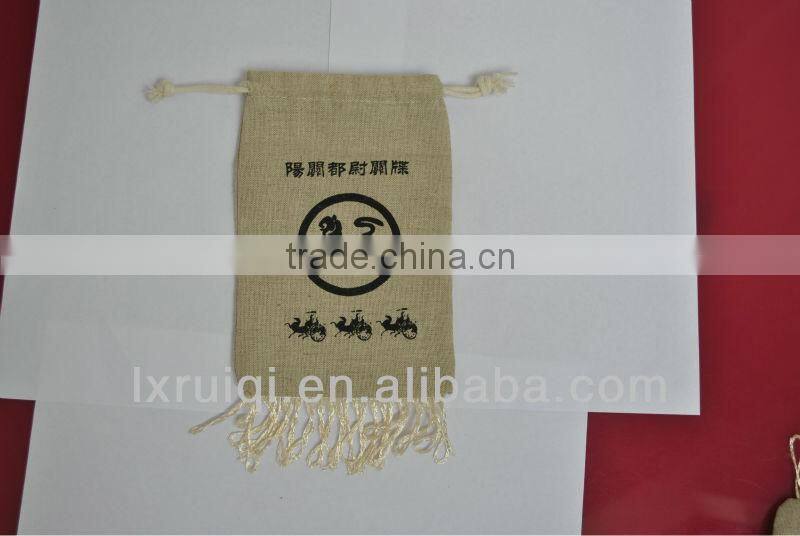 yiwu market cheap jute bag ,drawstring jute packing bags with tassel,promotion pouch