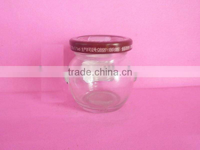 small glass container, glass pickle bottle