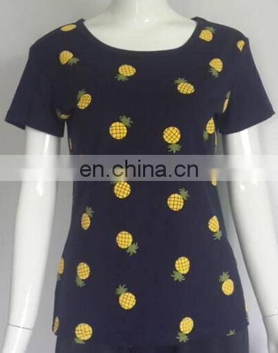 Lady's fitted blue o-neck tshirt with pineapple fruit screen printing