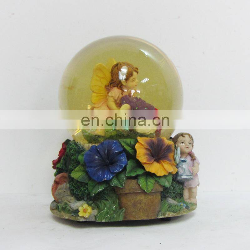 the ormate wedding couple water globe