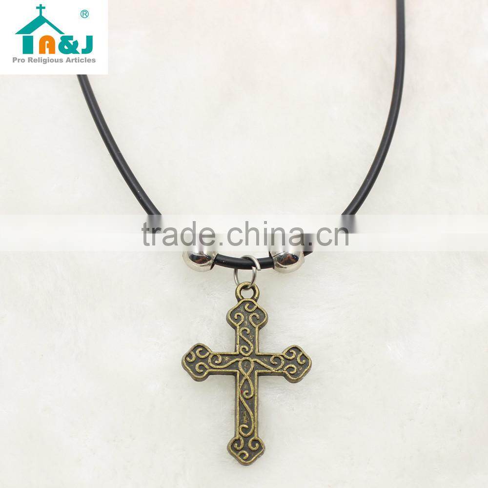 Antique brass cross cord pendant