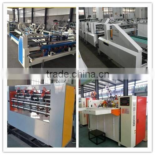 Automatic corrugated paperboard stacking machine