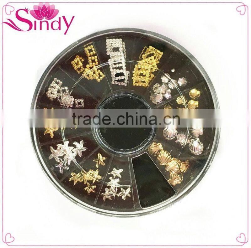 mixed gold & silver sea shell & seafish nail studs wheel