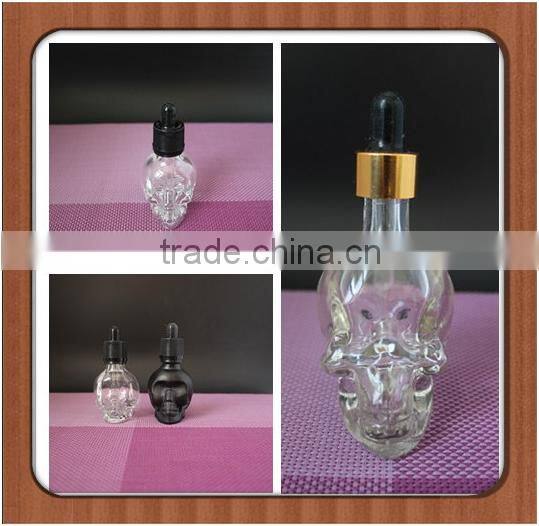 Small skull perfume bottle with frosted oil glass bottle with clear glass bottles with screw cap