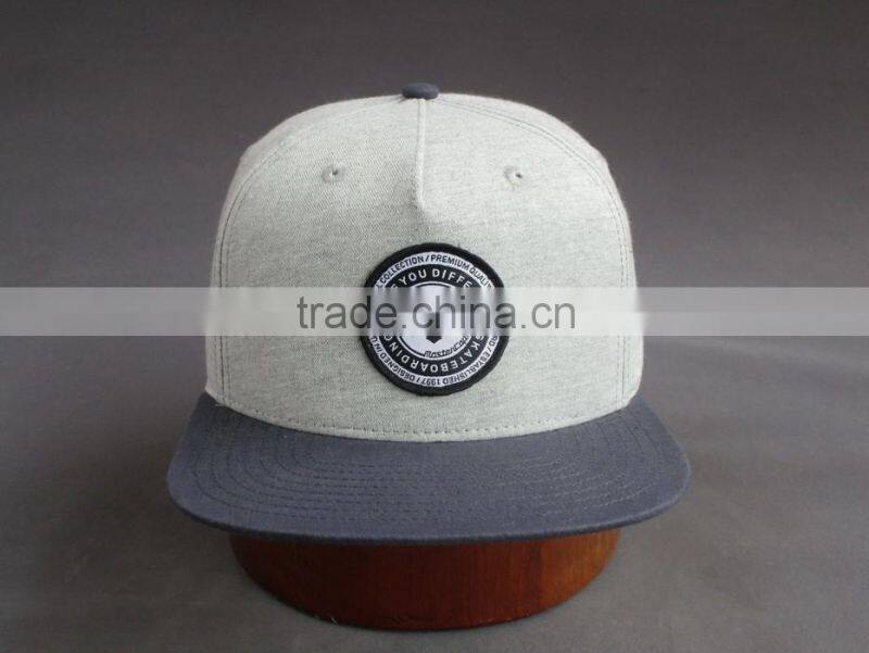 Custom 100% cotton 6-panel snapback cap with front woven label