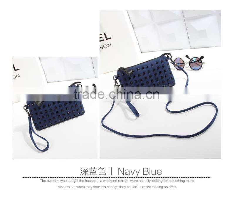 2016 Europea style factory directing selling high quality women blue clutch bag with rivet