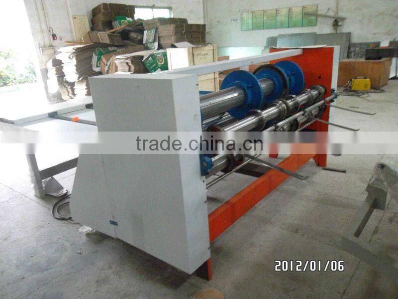 slitting creasing corner-cutting slotter