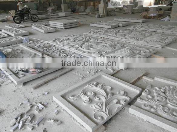 carved stone wall decoration