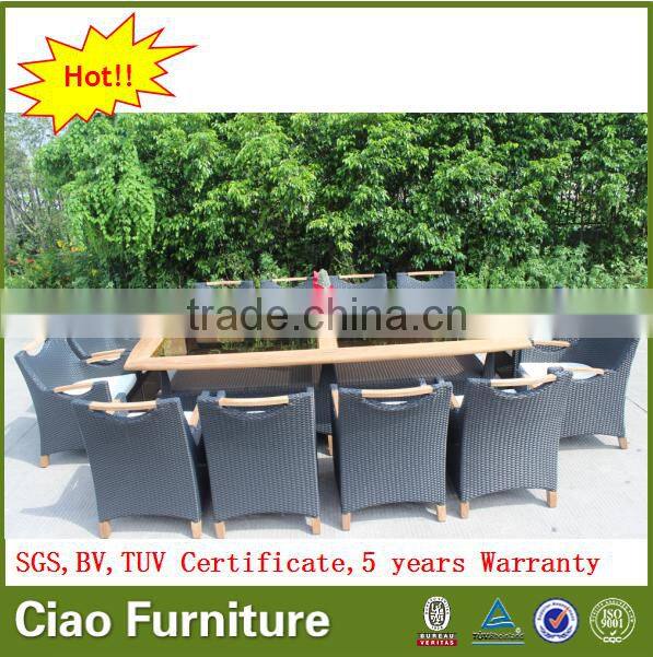 Luxury outdoor extended glass dining table and teakwood chairs