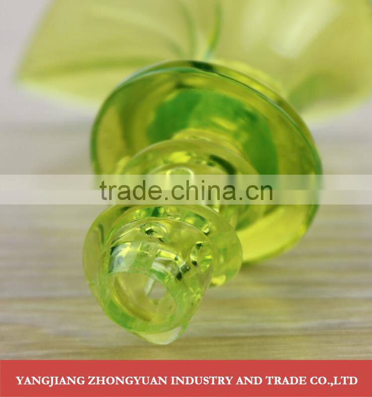 Plastic trumpet shaped hand lemon squeezer