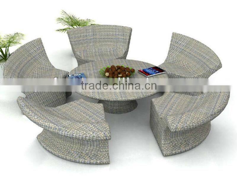 space-saving rattan hideaway dining table and chair set