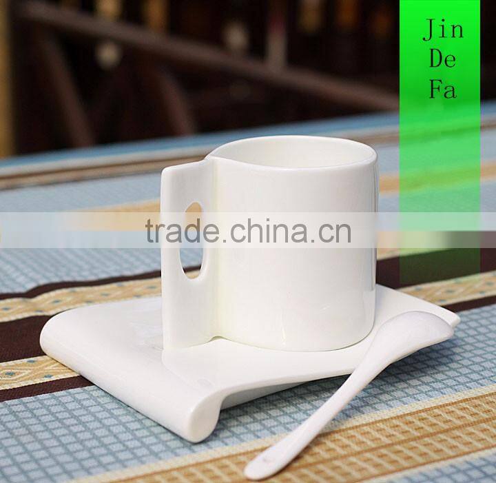 White porcelain ceramic coffee mug with saucer