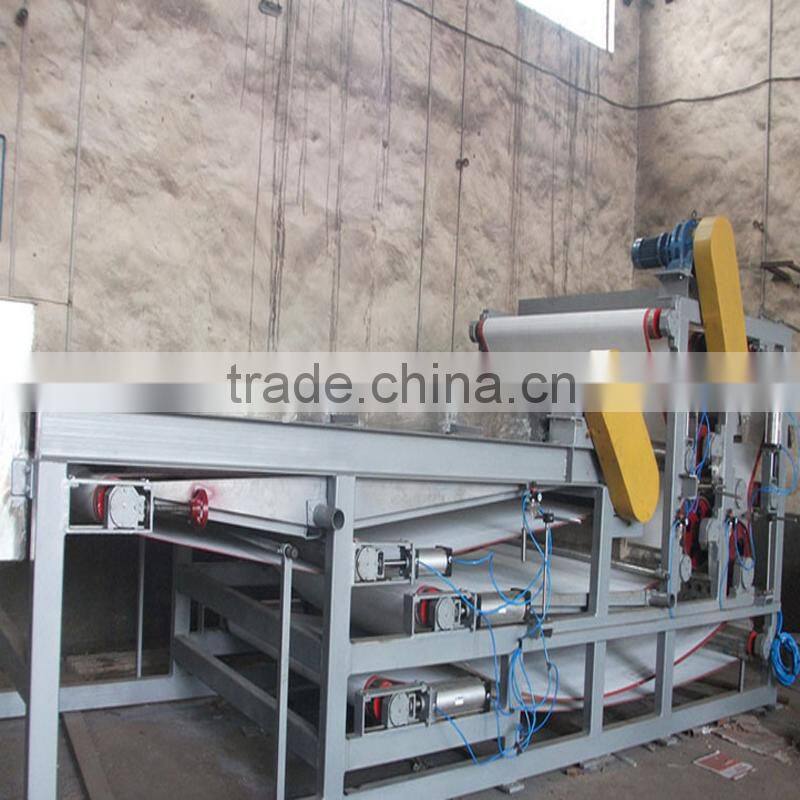High efficiency sludge dewatering belt press