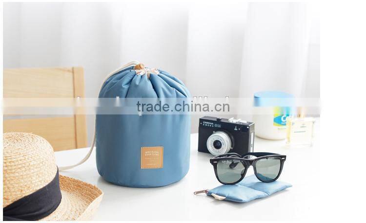 New han edition cylinder large volume waterproof draw string washing digital multifunctional travel to receive cosmetic bag