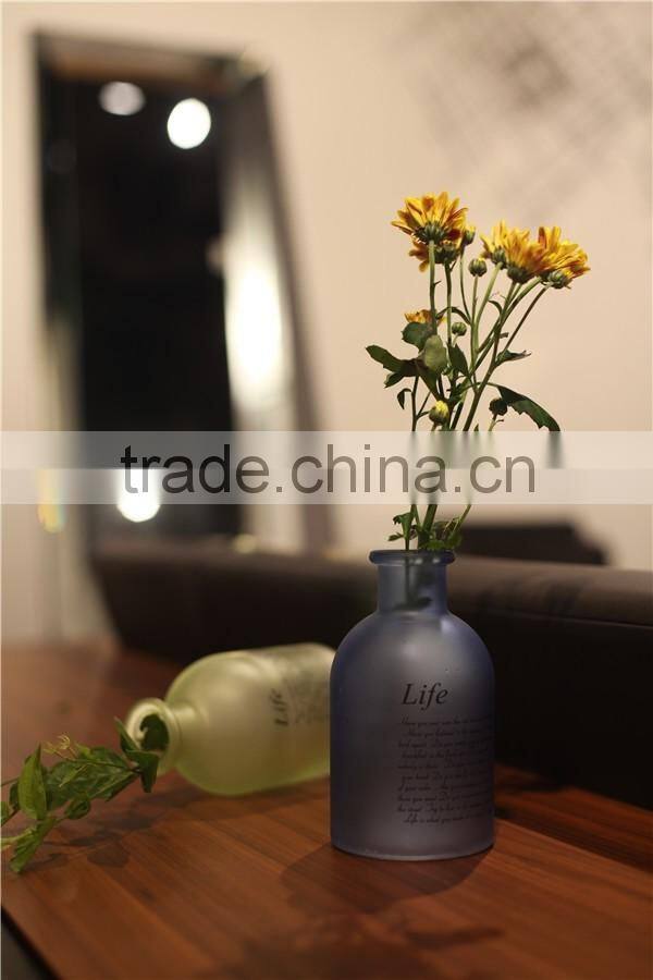 Lovely small round colored glass flower vase for living room