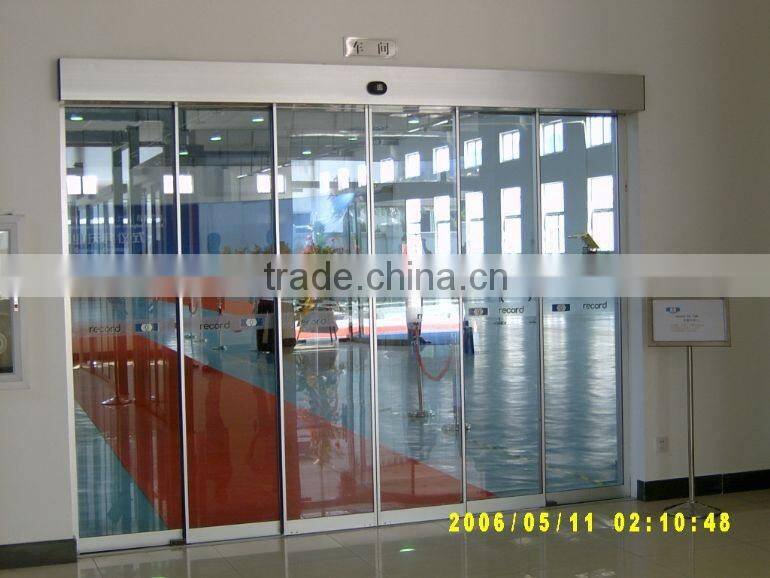 Telescopic automatic sliding glass doors operator