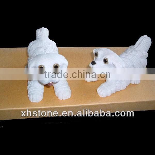 White cute little stone dog sculpture