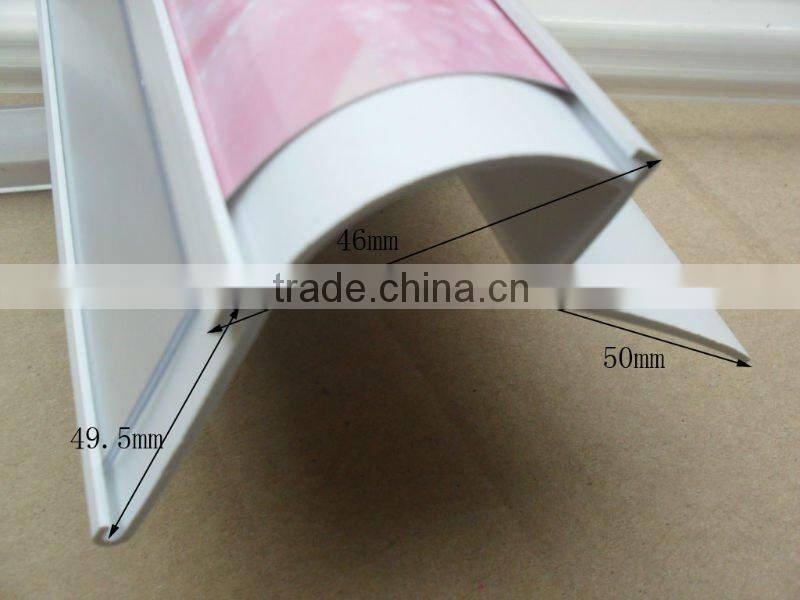 Co-extrued plastic paper holder