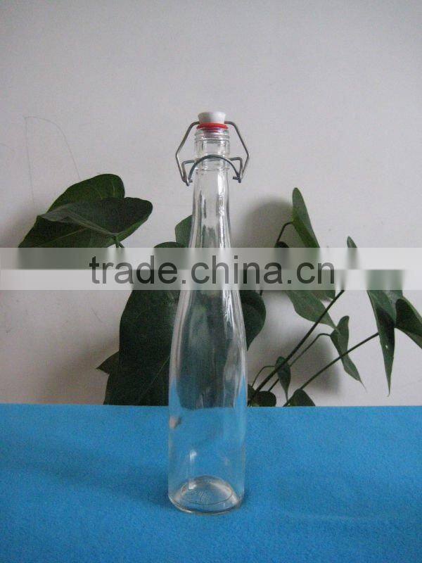 glass bottle with metal clip and plastic lid