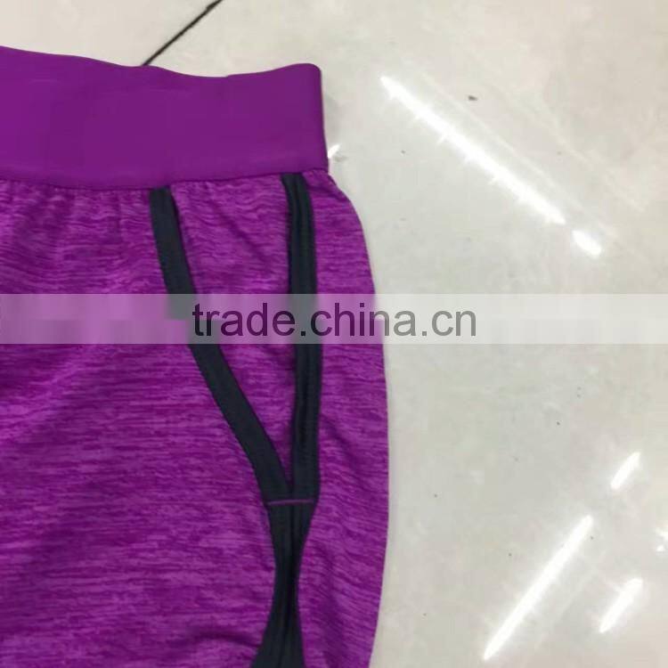 China garment stock lot factory price women cheap gym shorts