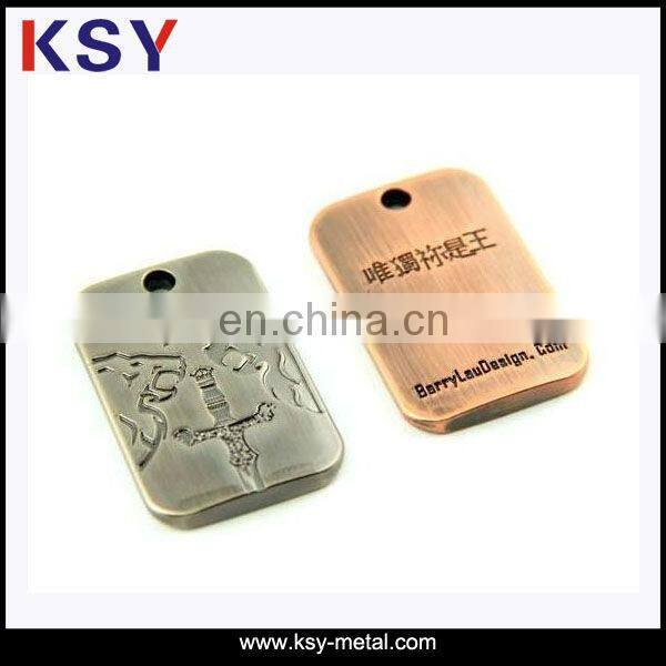 Wholesale price carved metal label for bags