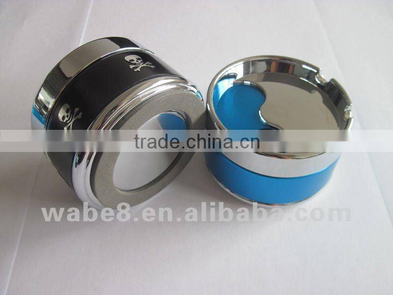 round portable metal ashtray