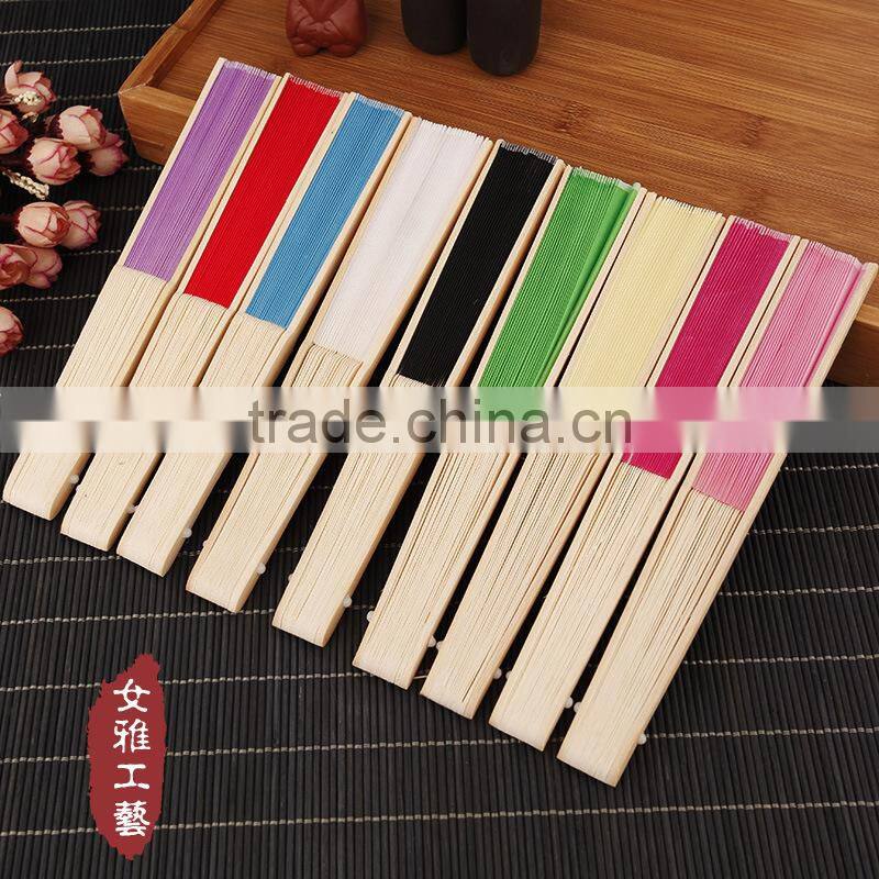 Factory direct bamboo hand fan wedding gift cloth folding hand fan in plain color