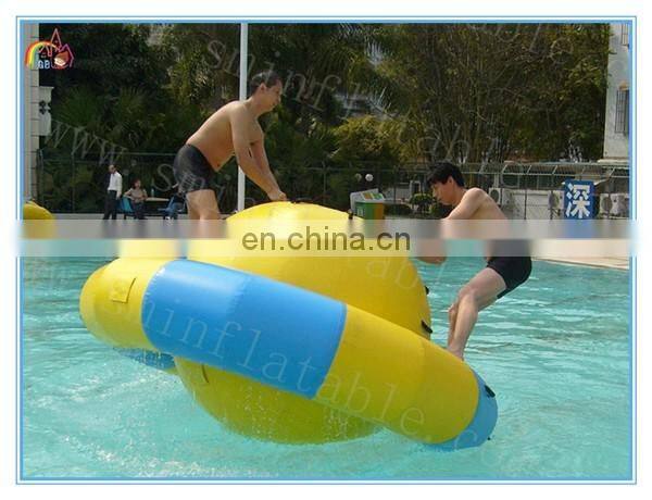 Commercial popular inflatable rotating top, inflatable water saturn & pool floating rocker for amusement outdoor water game