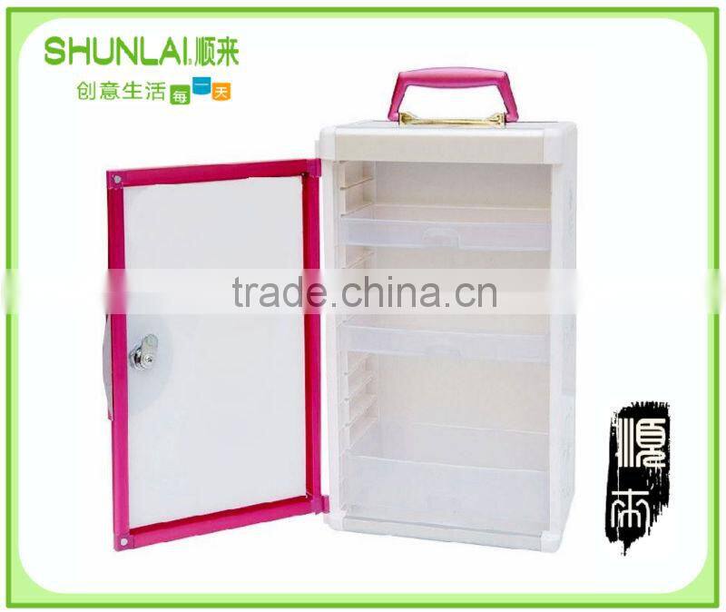 Plastic storage cabinet with drawer