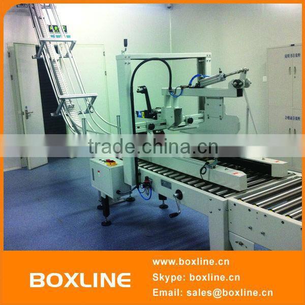 Automatic tape sealing machine