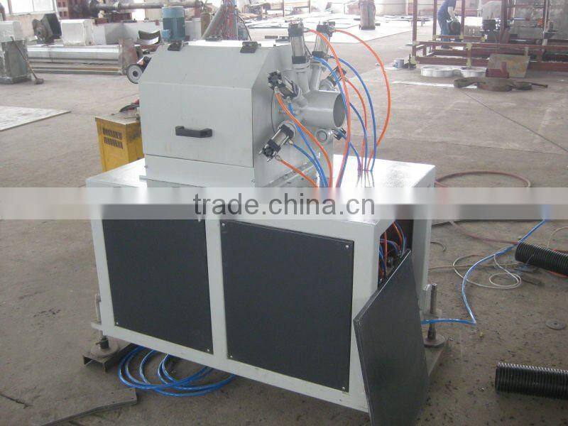Plastic pipe perforating machine