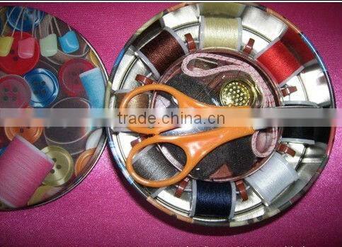 round sewing kit in tin