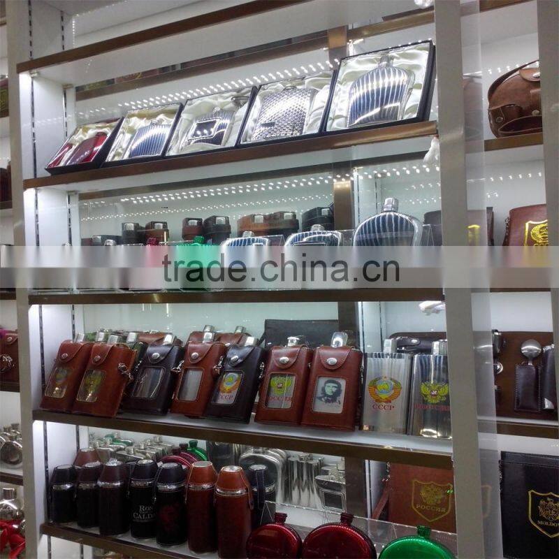 42oz round hip flask with print logo and spray pain coating then in leather bag.