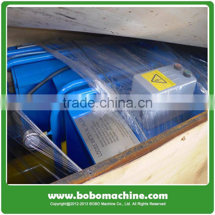 vertical baler with conveyor