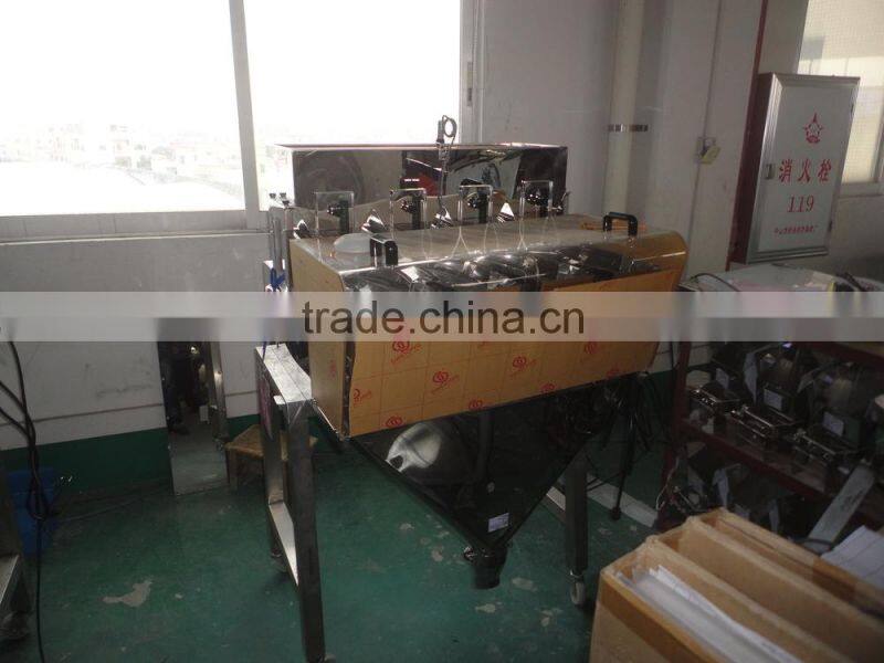 2015 4 head linear weigher