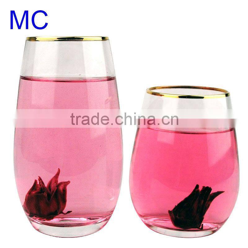 Hand blown clear water glass with gold rim